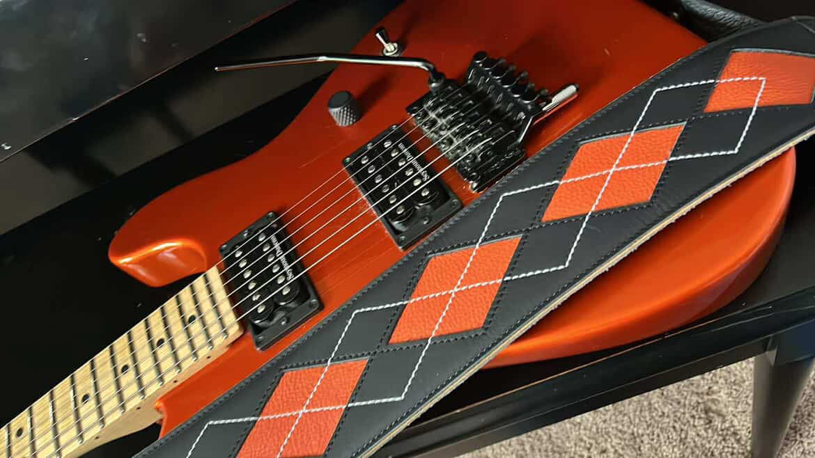 Everett - Carbon Black/Orange Peel Argyle Leather Guitar Strap