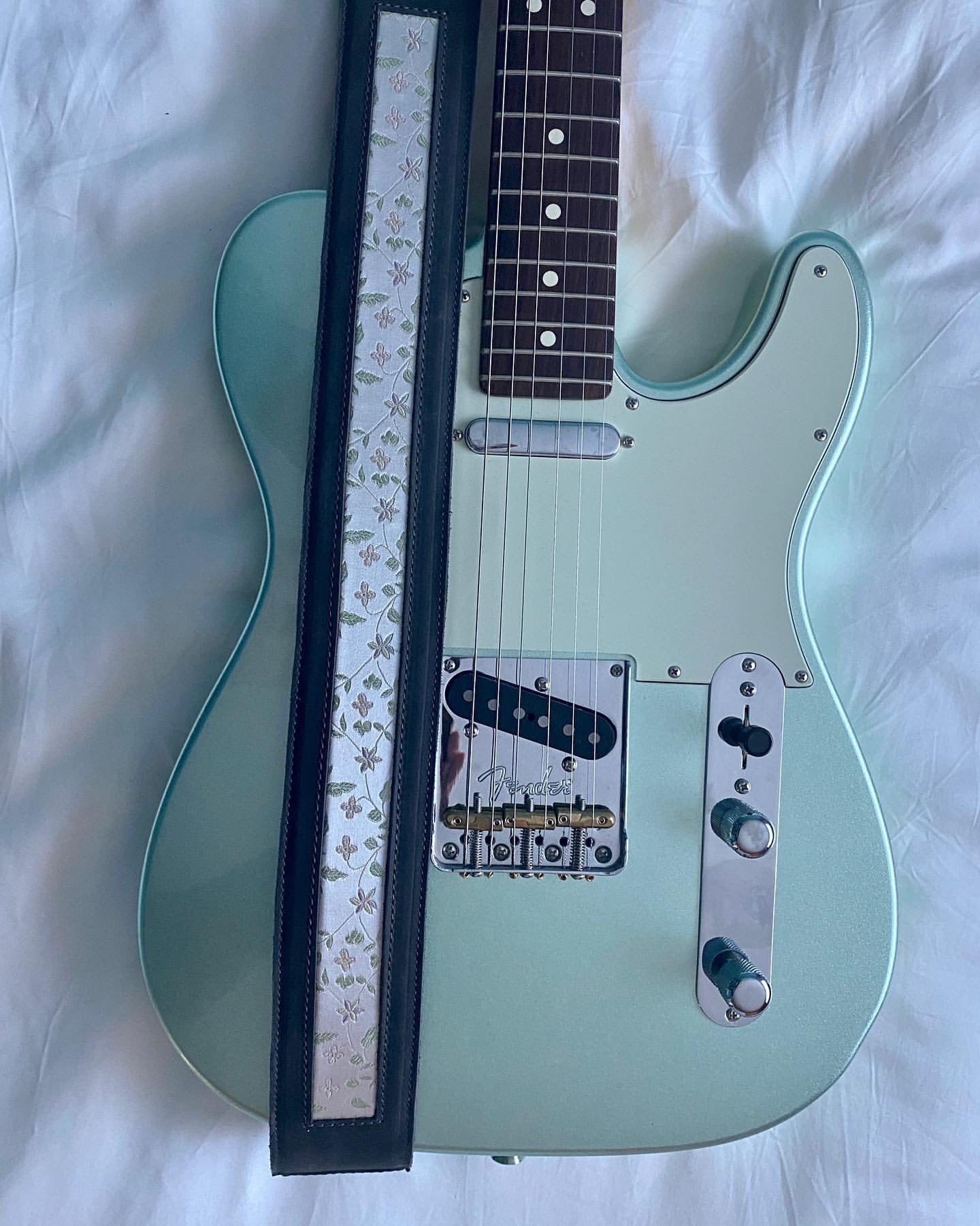 Sakura Guitar Strap on a Fender Guitar