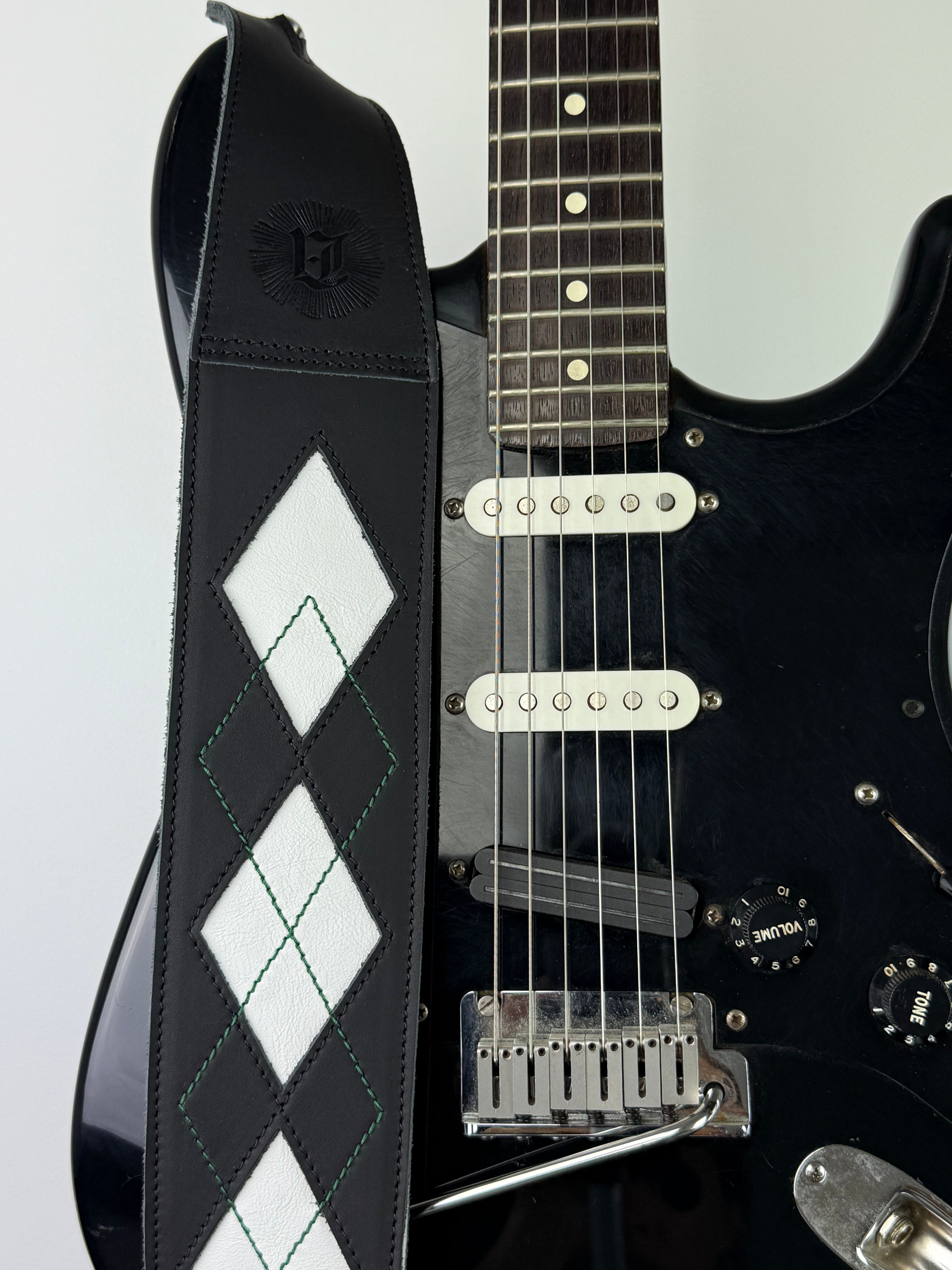 Everett - Carbon Black/White with Emerald Green Thread Argyle Leather Guitar Strap
